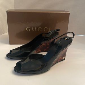Authentic Gucci wedges. Beautiful and timeless patent leather peep toe.